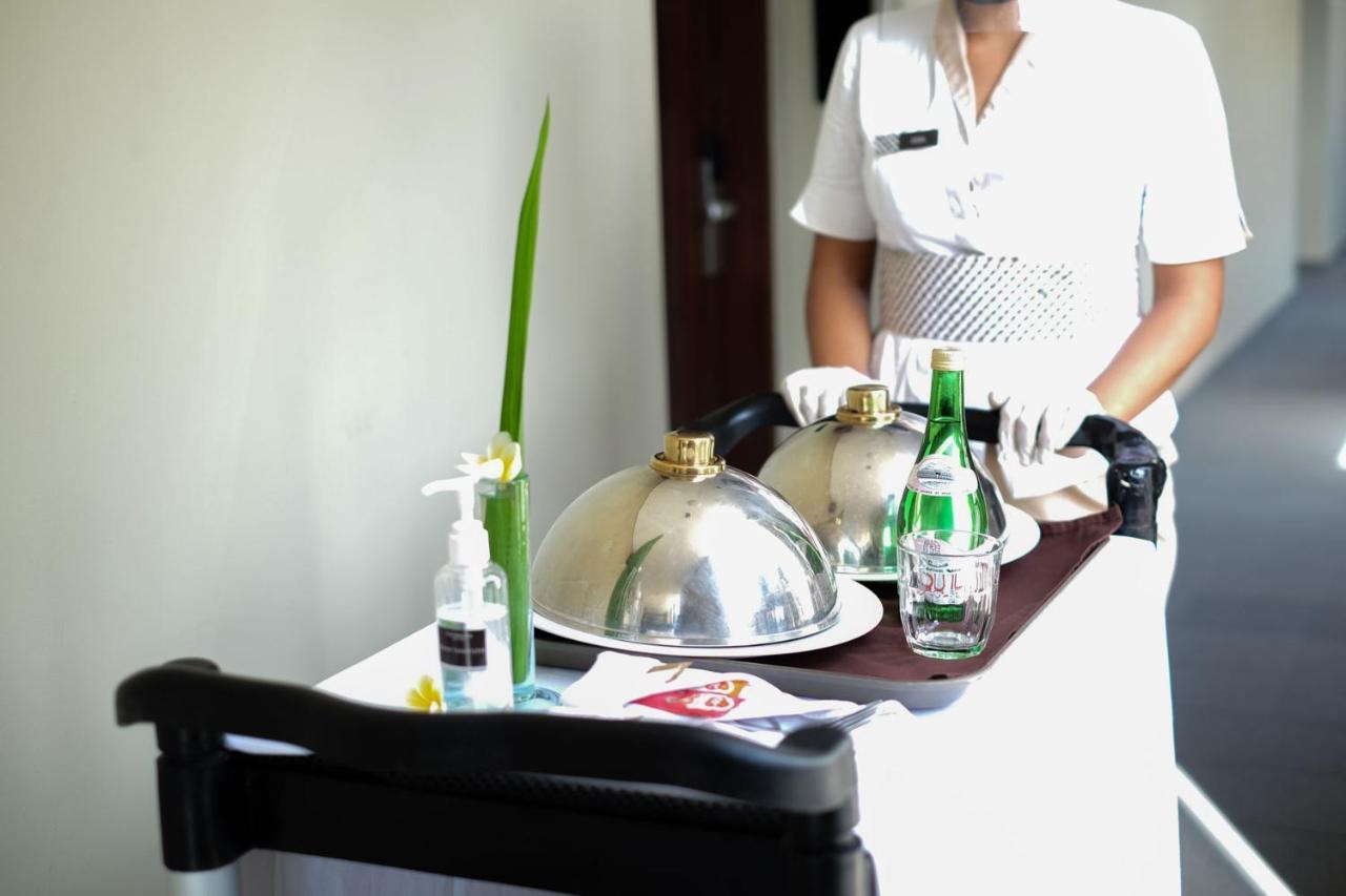 The Magani Hotel And Spa Legian  Exterior photo Room service