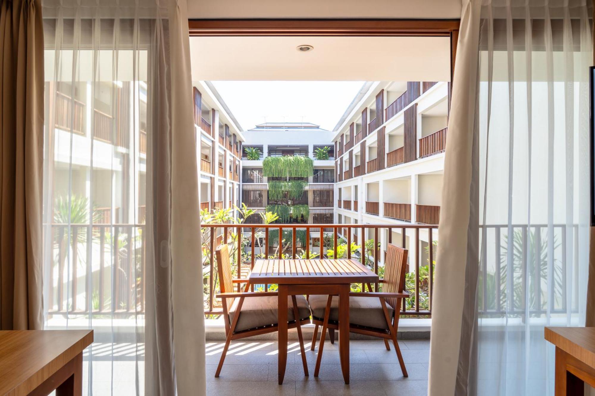 The Magani Hotel And Spa Legian  Exterior photo A view of the courtyard from a guest room
