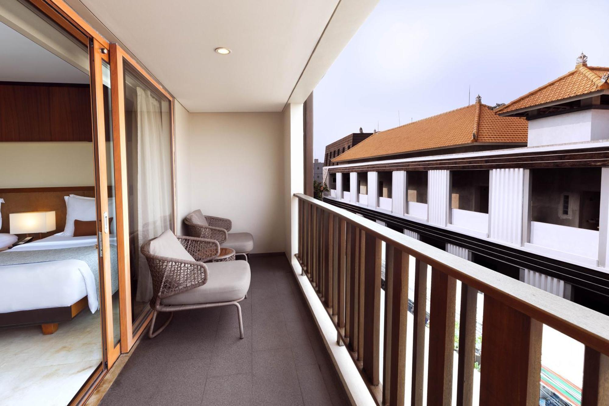 The Magani Hotel And Spa Legian  Exterior photo A balcony in a hotel room